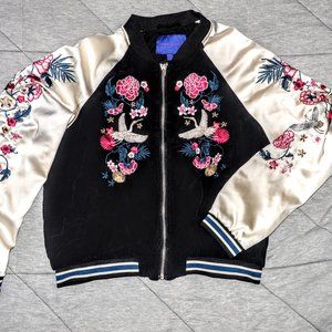 Black and cream embroidered bomber jacket.